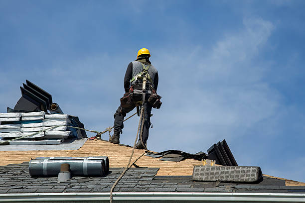 Professional Roofing technician working in Cable, OH